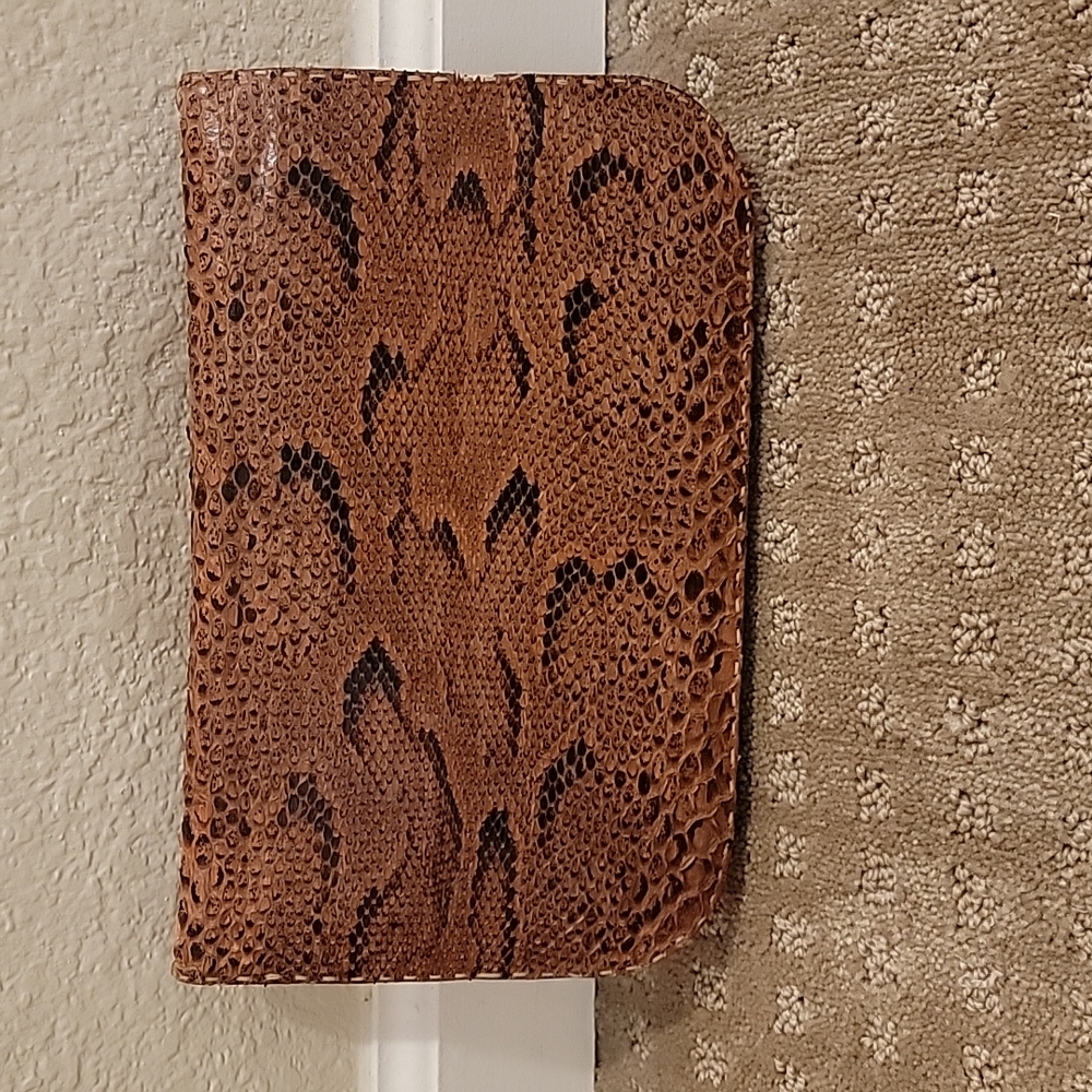 Python clutch, cognac color